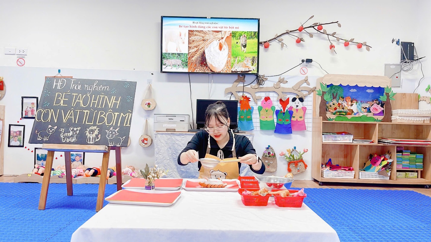 A person sitting at a table

Description automatically generated