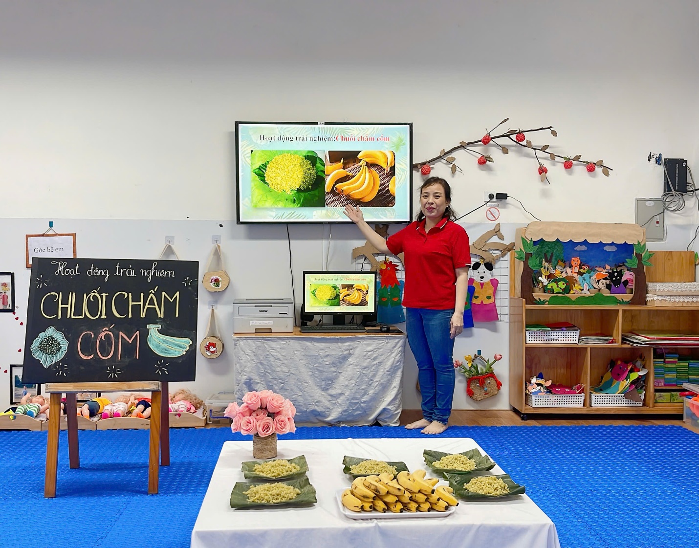 A person standing in front of a blackboard

Description automatically generated