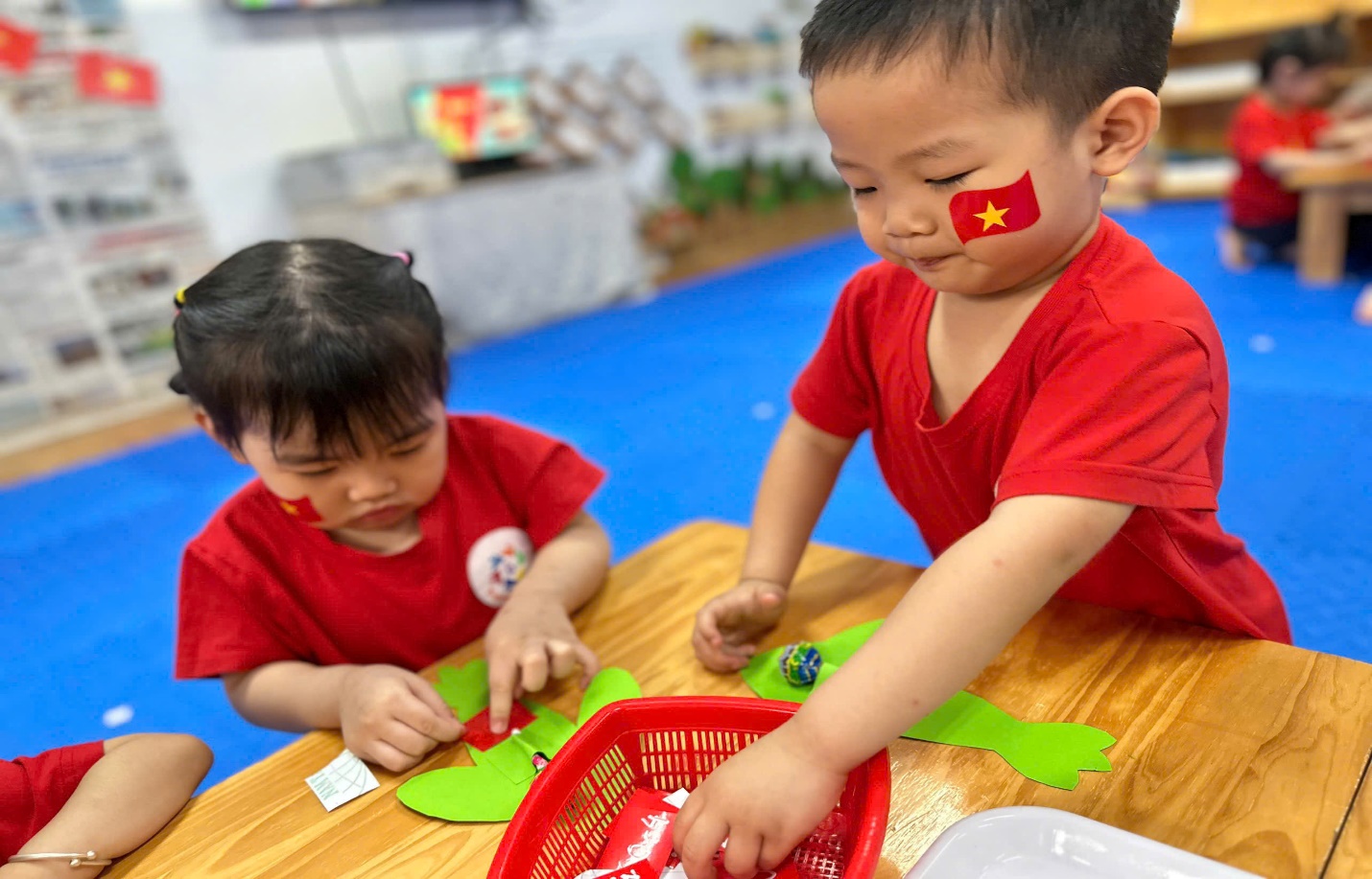 A group of children playing with crafts
Description automatically generated